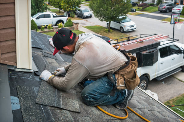 Professional Roof Installation technician working in Columbus City, IA